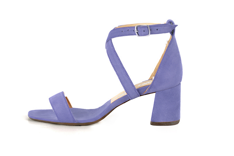 Women's  elegant sandals closed at the back with crossed straps. .  - Profile view